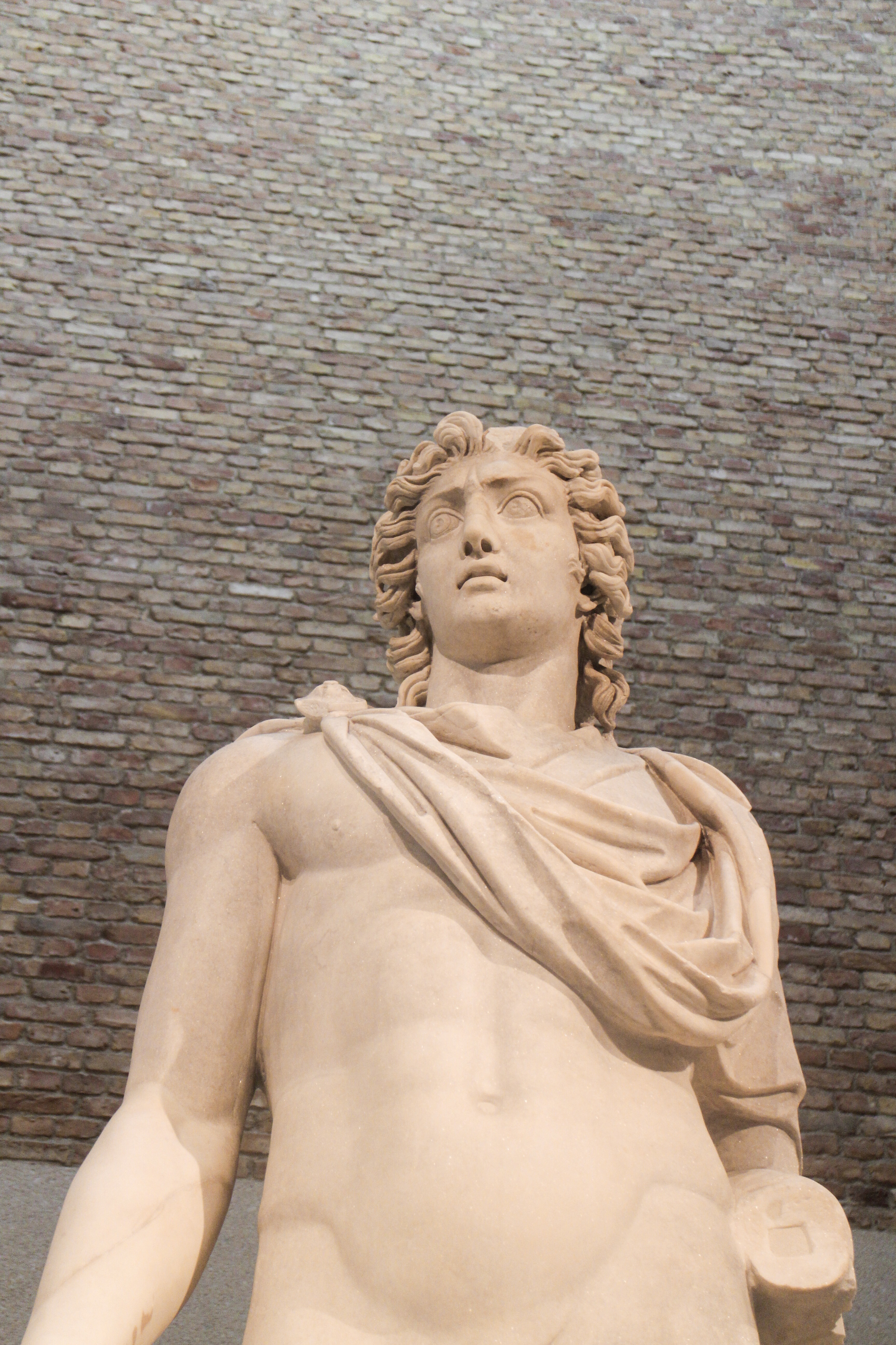 A statue of a Roman God