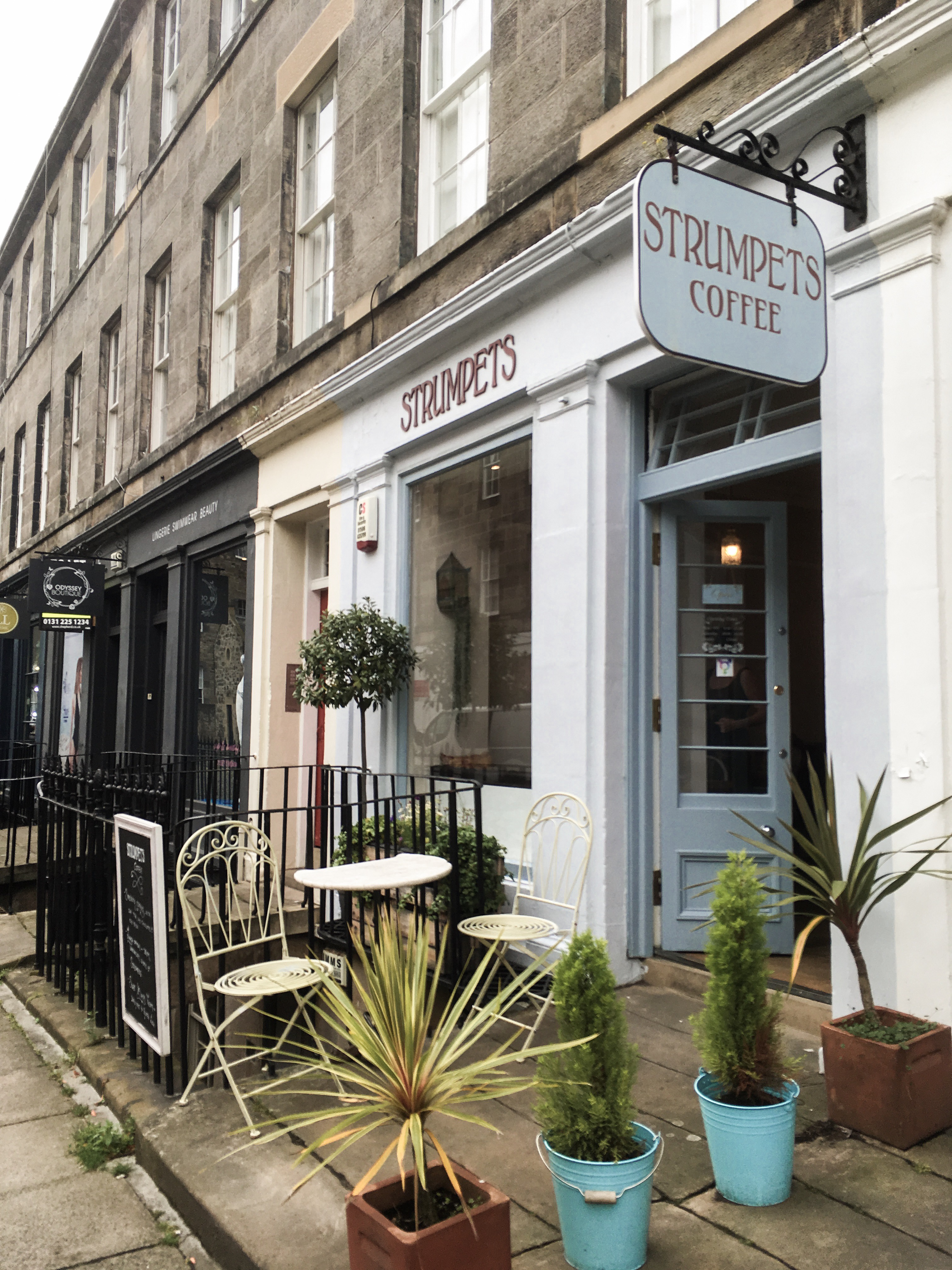 Coffee in Edinburgh: Strumpets. Light blue exterior of a coffee shop in Edinburgh's West End