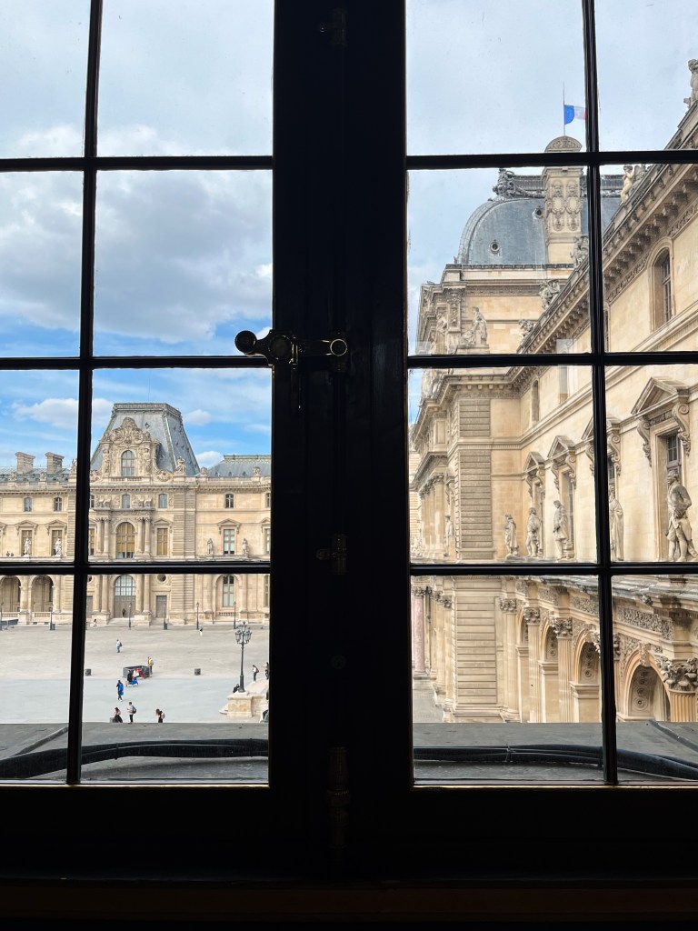 a window view from the louvre onto the central courtyeard